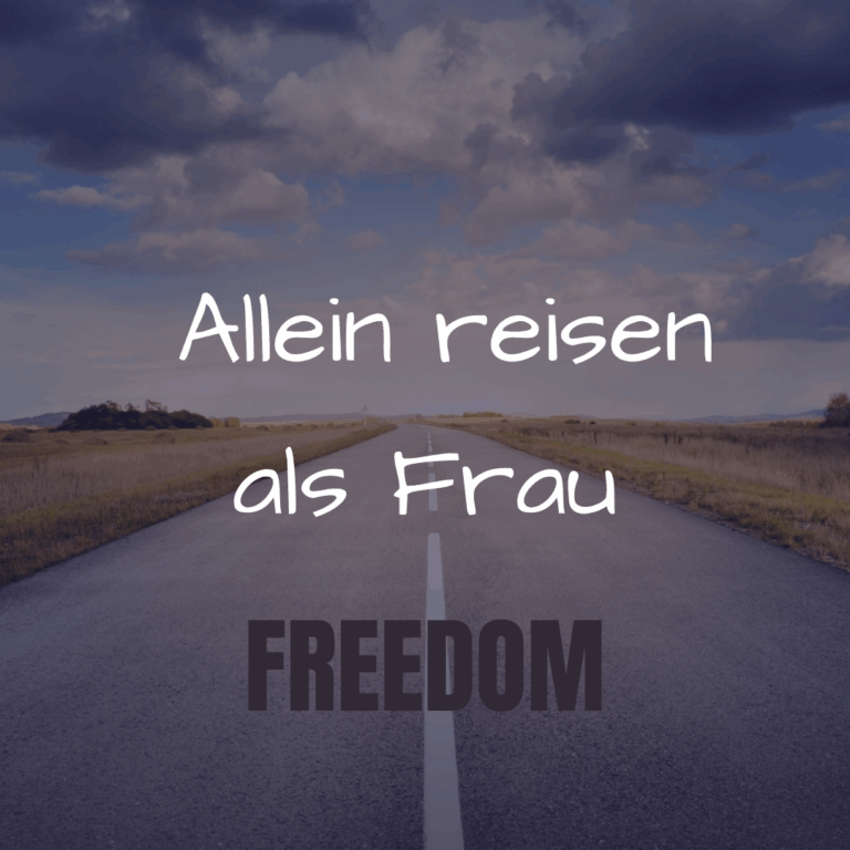 Leere Straße mit dem Schriftzug „freedom“ – starkes Sinnbild für Selbstbestimmung und den Mut, allein reisen als Frau zu leben.